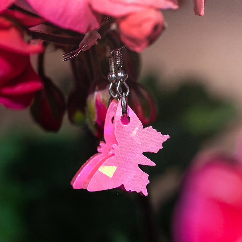 Pinkit perhoskorvakorut