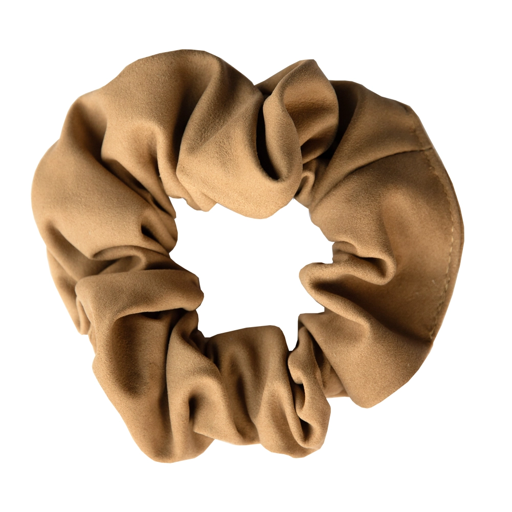 Kaakaonruskea nahkahiusdonitsi ommellaan käsityönä Suomessa. Valitse alta toivomasi koko joko 13 cm tai 10 cm halkaisijalla eli donitsin leveydellä.